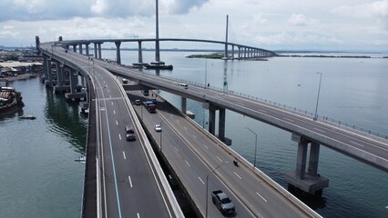 Aerial shot of the Cebu Cordova Bridge (CCLEX) full of cars, Mactan island