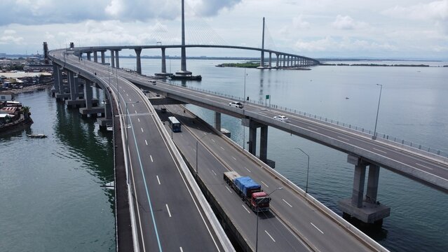 Aerial shot of the Cebu Cordova Bridge (CCLEX) full of cars, Mactan island