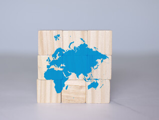 Bright blue europe map background made of wooden cubes. 