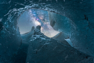 Fantastic icy Vatnajokull Glacier under shimmering starry sky