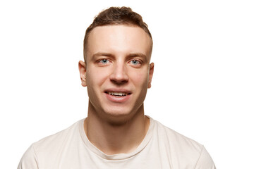 Portrait of young man with clear, smooth, shaved face isolated over white studio background. Men's cosmetology treatment