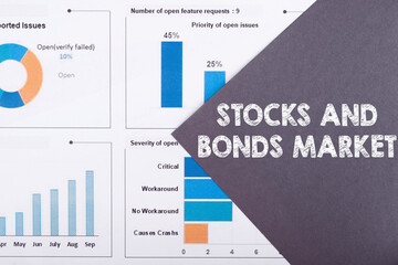 Text stocks and bonds market on gray paper note
