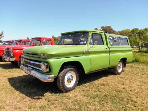 old 1965 Chevrolet C10 Apache pickup truck in the countryside. Autoclasica 2022 classic car show.
