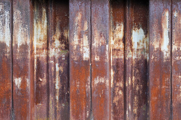 Old rusty metal wall as background.
