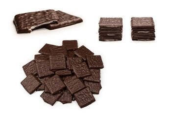 Dark chocolate candies isolated on white background.