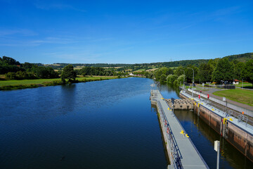 Fototapeta na wymiar View of the Wilhelmshausen lock in the Fulda valley in Hesse. Landscape at the Fulda with the surrounding nature. 