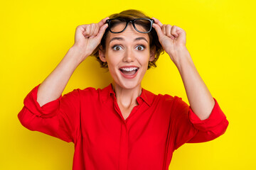 Photo of positive cheerful impressed girl with bob hairstyle wear red shirt finger touch glasses...