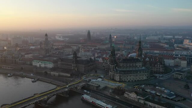 Aerial footage of Dresden city at sunset, unique medieval church buildings