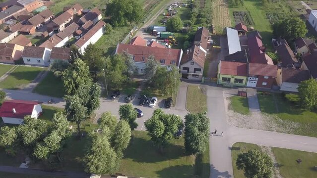 Aerial of a street and houses in Gunja, Croatia