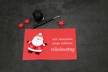 Glückwunschkarte mit Grüßen zum Nikolaustag. Wir wünschen einen schönen Nikolaustag.