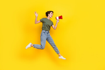 Full length photo of funky positive lady stylish clothes move look empty space shout shopping sale isolated on yellow color background