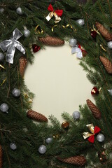 Christmas background with festive decoration and toys.On white wood surface. Holidays greeting card or banner composition with pine tree branches. Merry Christmas background and Happy New Year 2023.