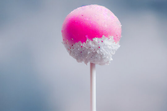 Sweet pink and white lollipop. generative ai