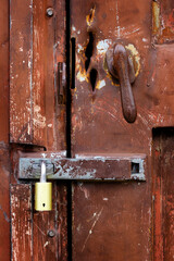 Old Rusty Handle on Door with Lock