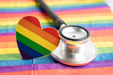 stethoscope on rainbow flag background, symbol of LGBT pride month  celebrate annual in June...