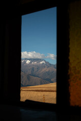 View of the mountains from a small venta at the Moray Ruins during sunset, Sacred Valley, Peru.