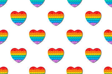 Rainbow Pop in the shape of a heart on a white backgro