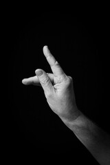 Hand demonstrating the Arabic sign language letter 'ظ' or 'Thah'