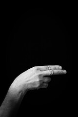 Hand demonstrating the Arabic sign language letter 'ع' or 'Ayn'