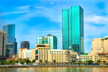Fototapeta premium Buildings in the central area of Ho Chi Minh City, along the Saigon River. The symbol of modernity and dynamism of the largest city in the country.