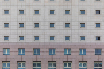 Building's facade. Reflection of the sky in the windows