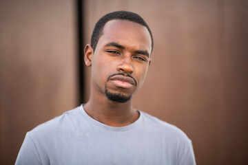 Fototapeta premium Serious looking young black man