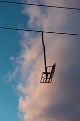 ski lift at sunset with pink and blue clouds