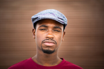 Handsome young african american man with cap