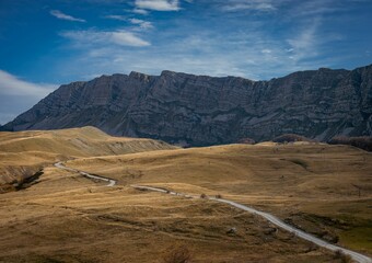 Scenic view of high rocky mountain on a sunny summer day