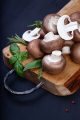 Fresh champignon mushrooms on wooden table - 546348320