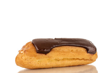 One sweet chocolate eclair on a white background, macro.