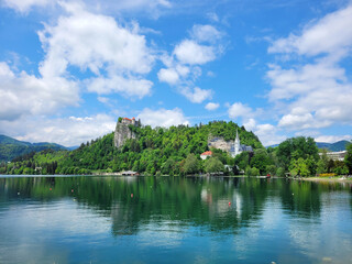 Fototapeta na wymiar landscape with lake Bled, Slovenia and Alps mountains. Spring vacation