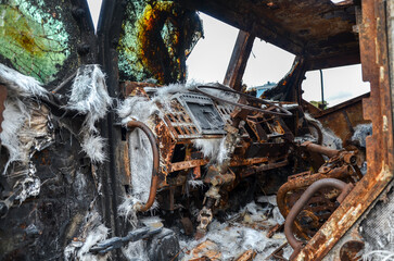 Cabine of destroyed mine-resistant armored vehicle of russian invanders during war in Ukraine