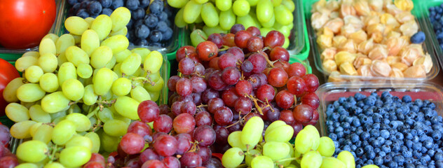 Fresh Fruit in farmer market. Various colorful fresh fruits on stall.