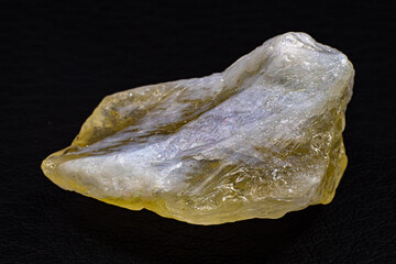 Close-up macro real raw semi-transparent light yellow citrine with white quartz crystal stone...