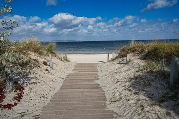 Wooden footpath leading to the beach in Rugia Island, Germany