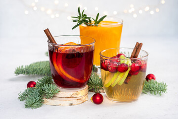 Sangria or Mulled wine with Apple, cranberry and orange for Christmas table