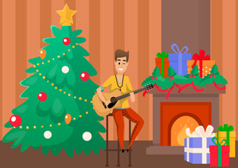 Handsome man sits near fir tree with guitar and sings festive song. New Year and Christmas. Winter celebration and holidays. Happy vocalist performs verses with melody at family party with fireplace