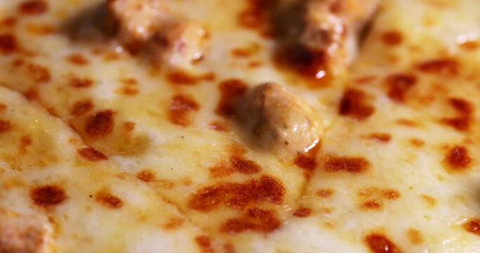 Close up shot of delicious freshly prepared pizza. Tasty Italian pizza