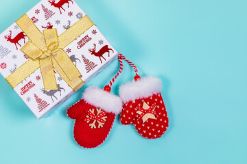 Christmas banner, holiday box with toys on a blue background.