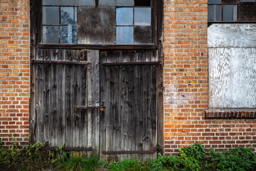 Huge wooden door to the abandoned warehouse
