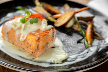 Typical peruvian food and drinks, trout with onion compote