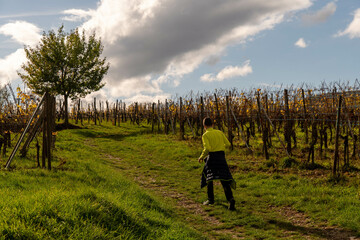 boy hiking in the vineyards