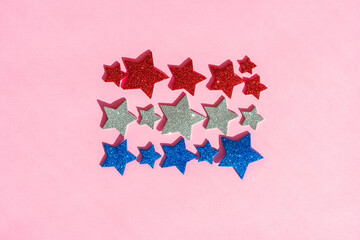 Independence Day. Stars on a pink background.