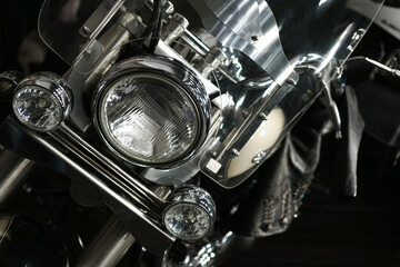 motorcycle light close-up detail of a chrome motorcycle                           