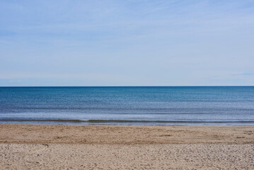 Fototapeta na wymiar A lonely beach, blue sky, empty space