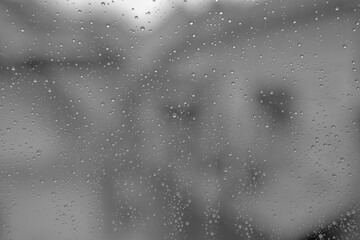 rGrey colors, rain drops on window