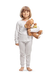 Full length portrait of a little girl in pajamas holding a teddy bear
