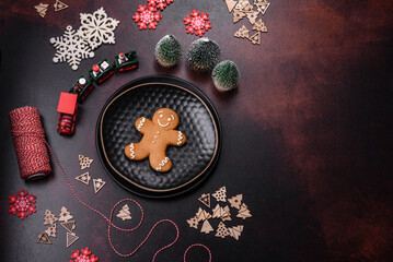 Home festive Christmas table decorated by toys and gingerbreads