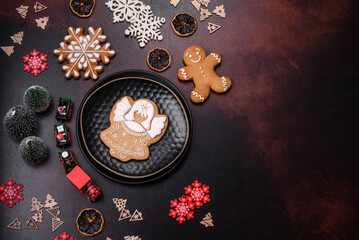 Home festive Christmas table decorated by toys and gingerbreads
